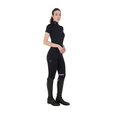 Strato base aderente a maniche corte da donna in tessuto tecnico Equestro Nero / lilla Strato base aderente a maniche corte da donna in tessuto tecnico Equestro Nero / lilla
